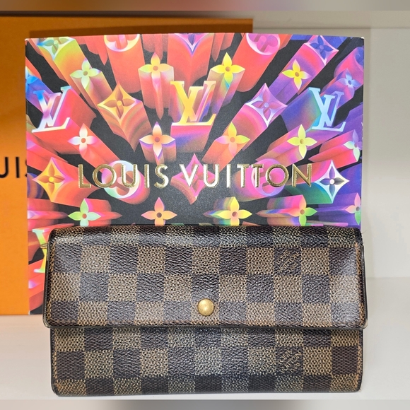 Louis Vuitton Handbags - Louis Vuitton wallet in iconic Damier Ebene coated canvas with gold hardware